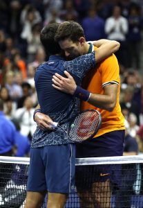 Novak Djokovic and Juan Martin del Potro hugging after the US Open final