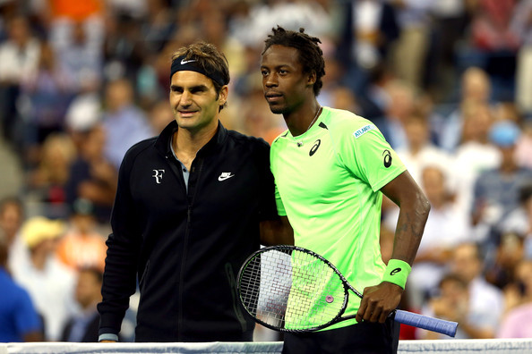 Roger Federer and Gael Monfils on Day 11 at the 2014 US Open (Sept. 3, 2014 - Source: Elsa/Getty Images North America)