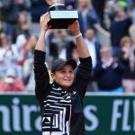 Ashleigh Barty raising the 2019 Roland Garros trophy