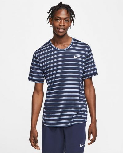 Model in Nike Mens Team Court Dry Graphics Top Obsidian Blue